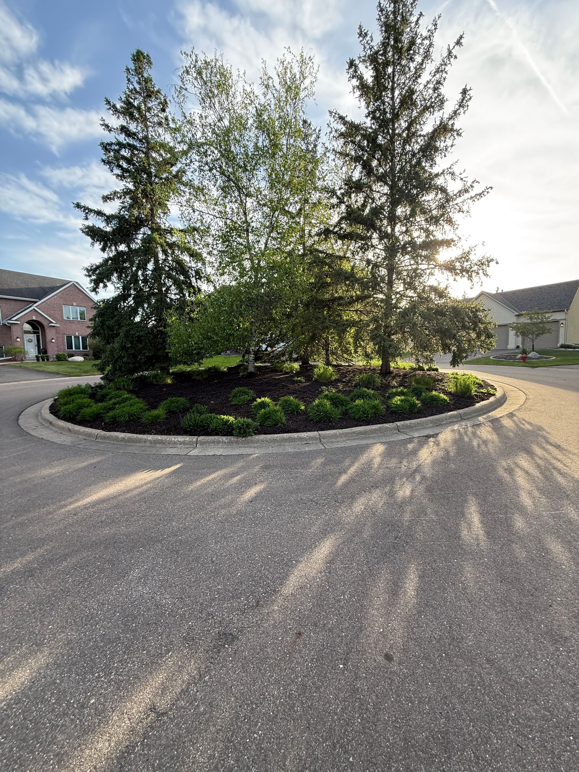 HOA Entrance and Cul-de-Sac Bed Refresh with Mulch and New Plantings