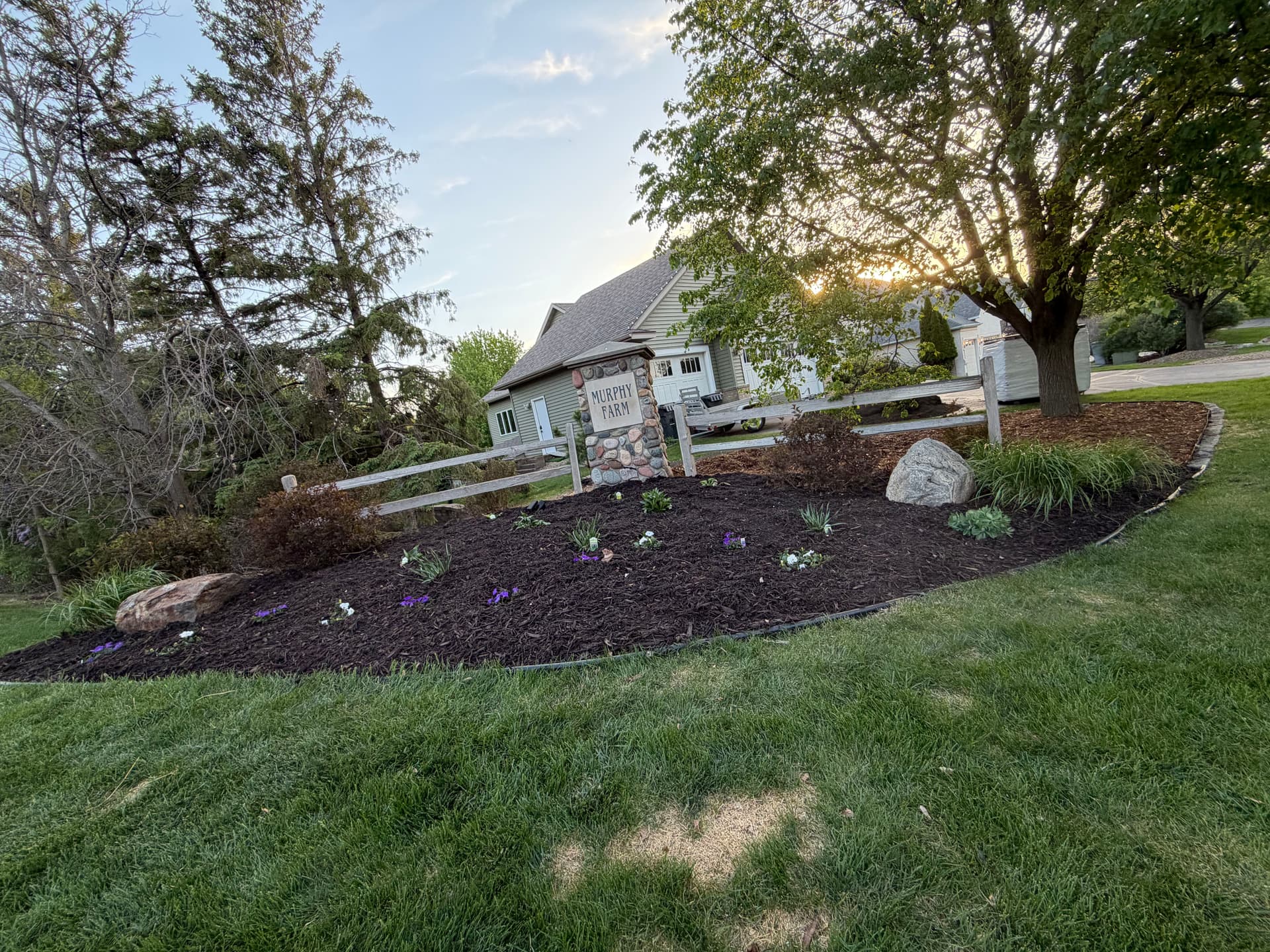 HOA Entrance and Cul-de-Sac Bed Refresh with Mulch and New Plantings